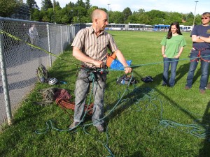 Jon demonstrating a belay from top