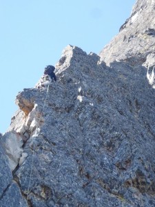 Veronika leading a 5.8 on the final headwall.