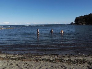 Washing off salty sweat in the salty ocean.