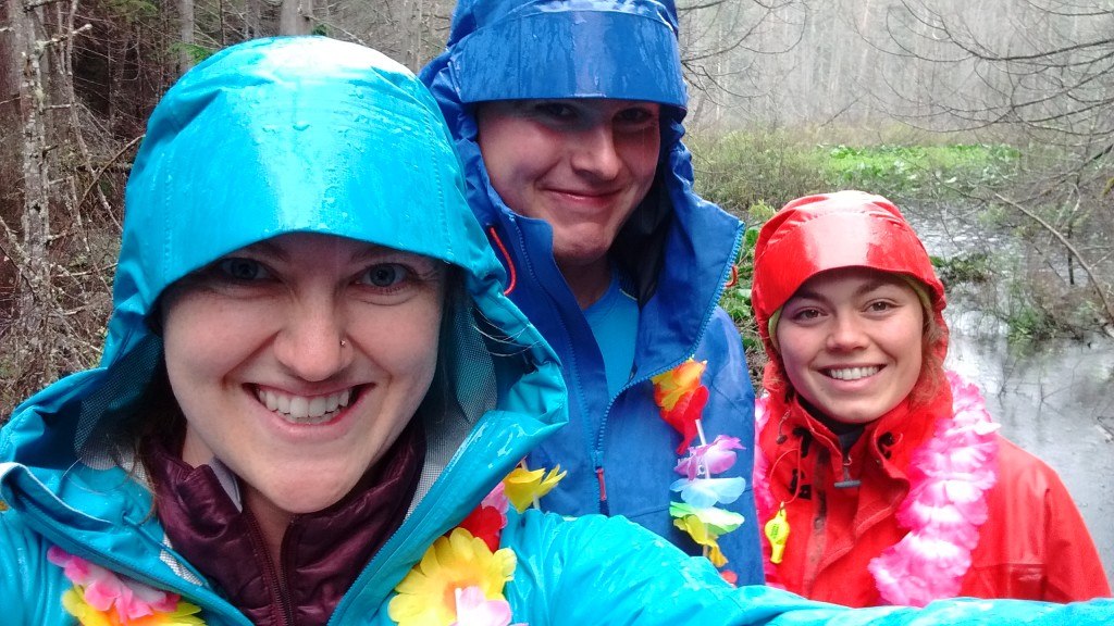 Cora, Jake and Roseanna hiking in the rain.