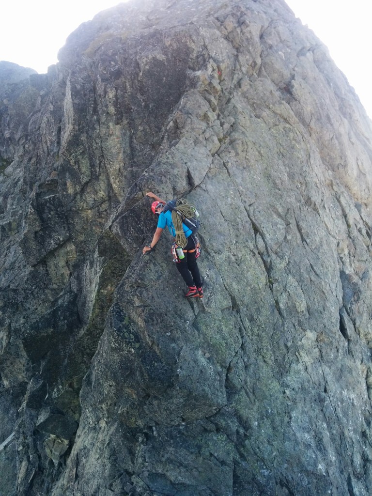 Matteo wishing he was on belay while climbing this airy arete. Photo: Kevin Burton