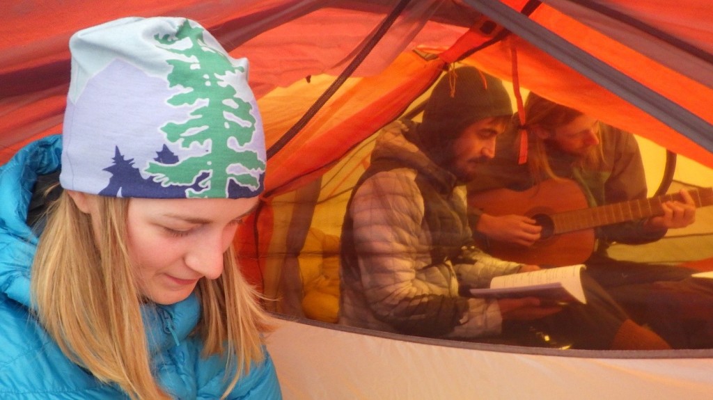 Playing guitar and singing in the tents. Photo by: Cora Skaien.