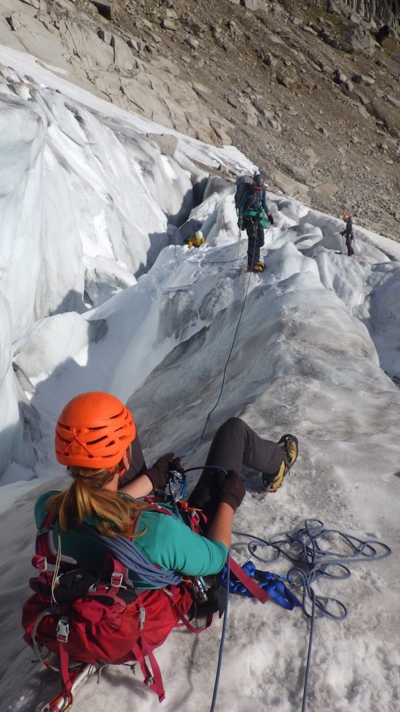 Jeff belaying the rest of the crew over. Photo by: Cora Skaien.