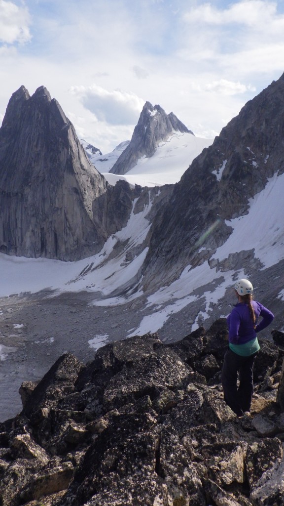 Cora enjoying the first views of Pigeon Spire (middle) with Snowpatch Spire on the left. Photo by: Carly Peterson.