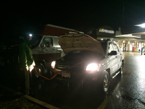 Jumping the van to life in the Pemberton McDonalds parking lot. Credit - Nathan