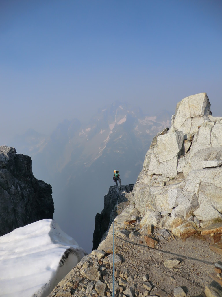 Caitlin topping-out on the summit ridge. Photo by Julien Renard