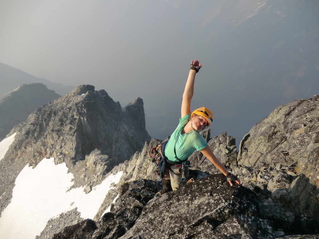 Caitlin enjoying the summit. Photo by Julien Renard