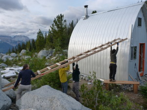 How to move a ladder that weighs more than you do. Photo: Roland Burton