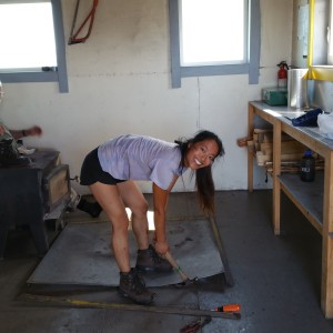 Lianna reno'ing the wood stove.
