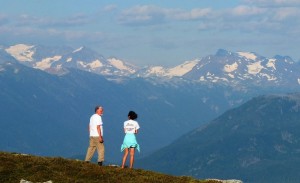 Roland shares some stories with Sarah C. while looking out towards the peaks of Garibaldi from Brew