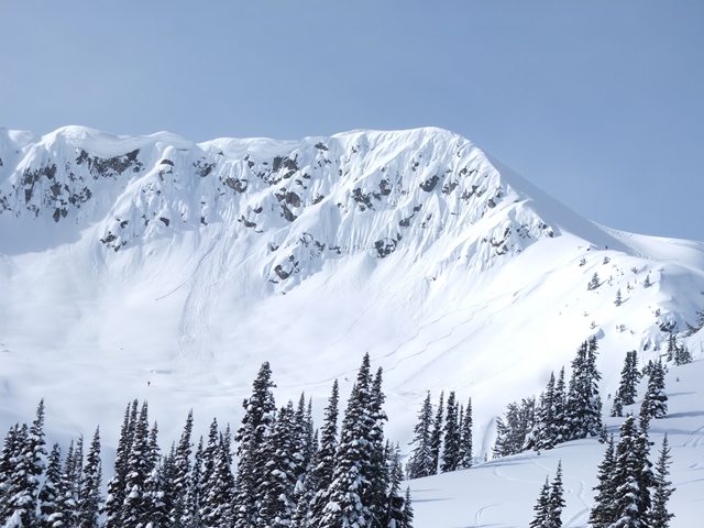 Jeremy at the bottom, Marco on the slope and Ian watching from above. Can you spot them? Photo Elliott Skierszkan.