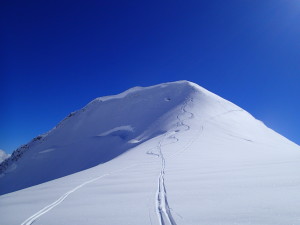 Nick Gobin dropping a cornice off of Tent Peak. Snow conditions were good here.