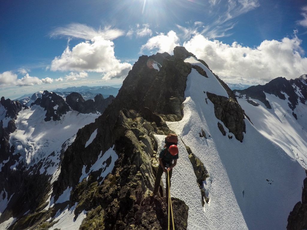 Kevin rappelling off a gendarme. Photo: Matteo Agnoloni