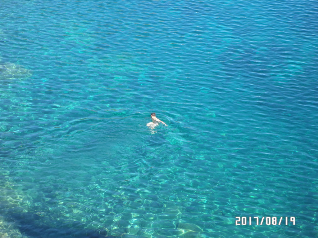 Nick enjoying the brilliant blue waters of Schjelderup Lake.