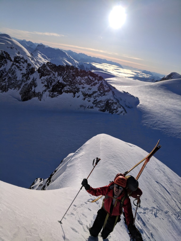 Nick bootpacks up the ridge to gain the summit of Eureka Mountain. 