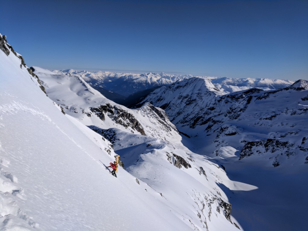 Nick bootpacking around the southeast face of Eureka to regain the northwest ridge.