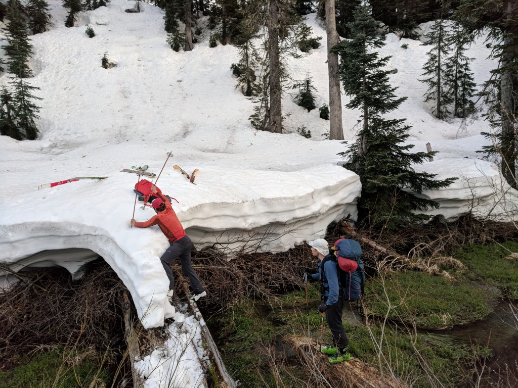 Skyler leads the way across a final crux: A technical bog/creek crossing. Photo: Olek Splawinski