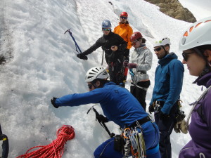 Building ice anchors (photo by Christine Beaulieu)