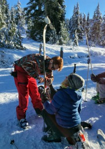 Birgit and a whiskeyjack helping me with my ski repairs (round 2)