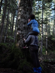 Declan and Teagan getting a trail marker up to viewing height (faff). Photo Cred: Erica Haugland