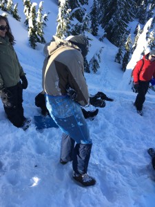 James going "diaper style" down the sledding hill.