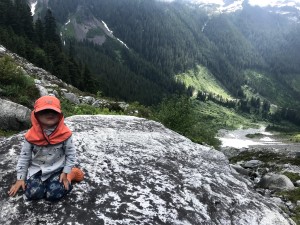 Resting on a rock along the steep descent