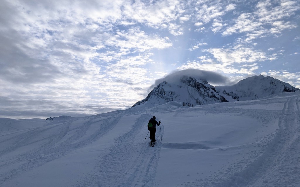 Skinning over snowmobile tracks on Brohm Ridge