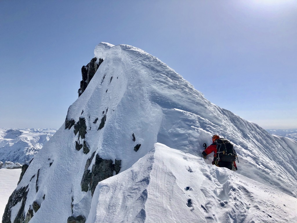 Julien inspecting the condition for climbing the final ~40m summit block.