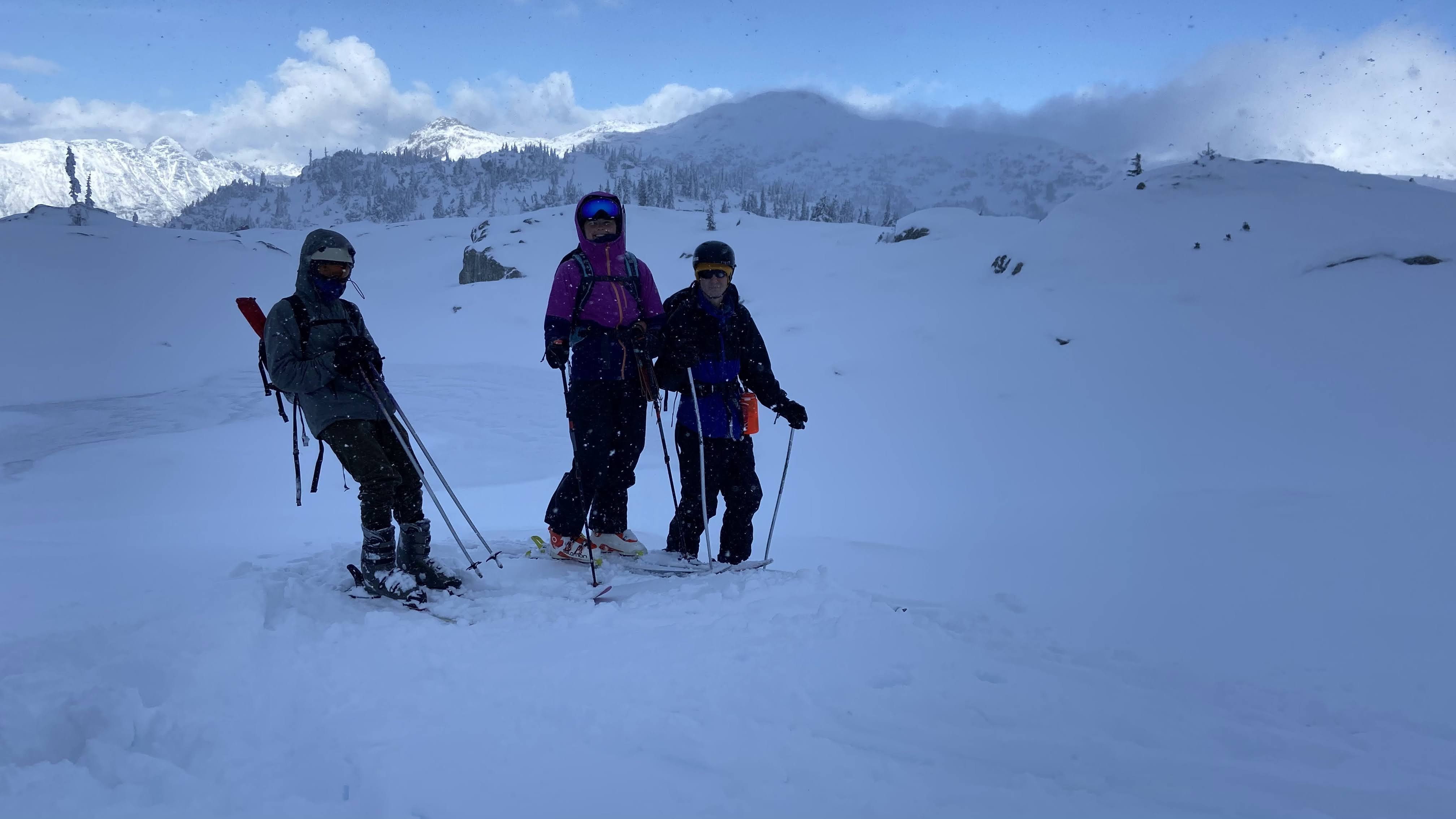 Happy skiers enjoying the first powder of the season: Thomas, Kaila & Alex
