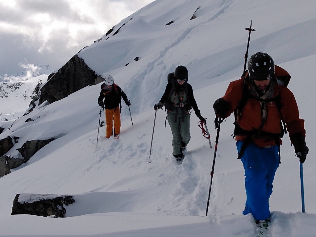 Starting the final bootpack by dropping off the bump where we ditched our skis.