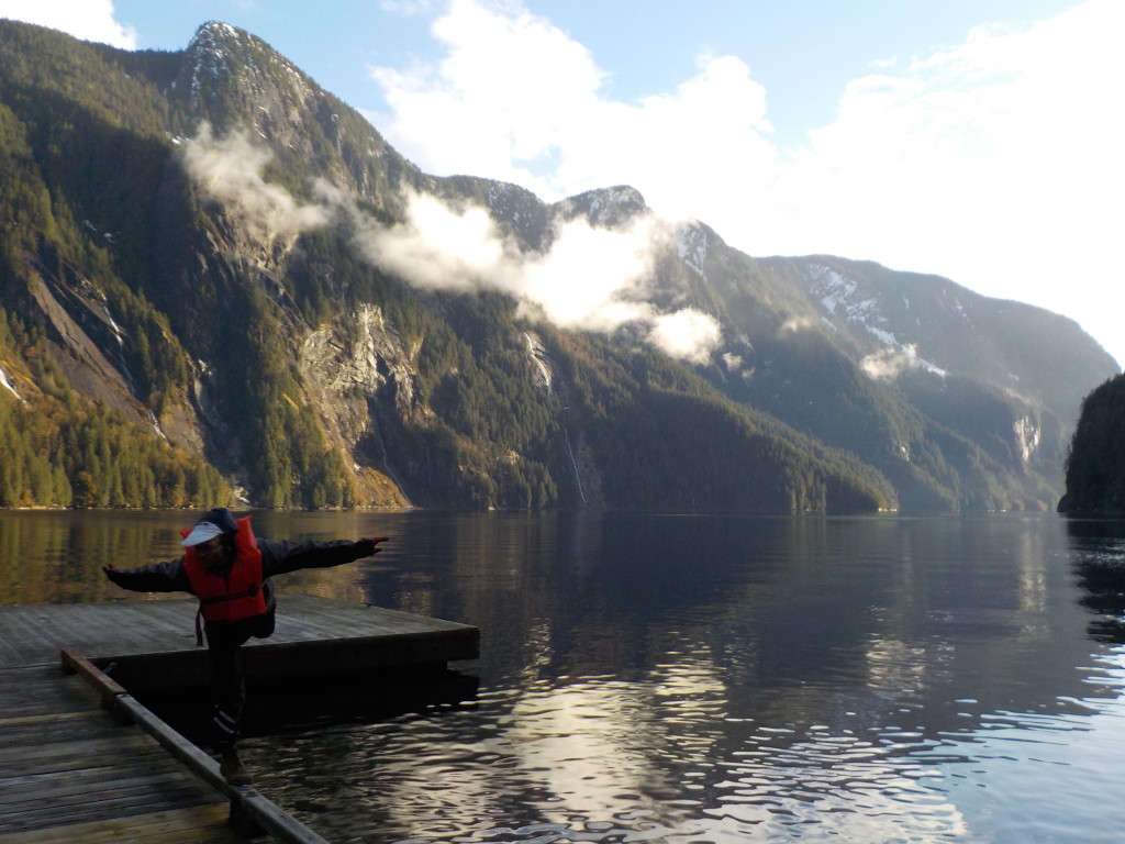 Simeon demonstrating the flying camel at the dock at the end of Princess Louisa inlet. PC: Hannah