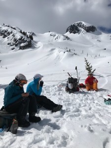 Waiting for the heli. MJ eats a fresh and undressed snow cone, and Will eats banana bread.  