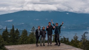 Nadia, Susanne, Alex and Finn posing at the summit
