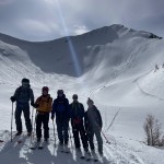 Group posing in front of our ski tracks