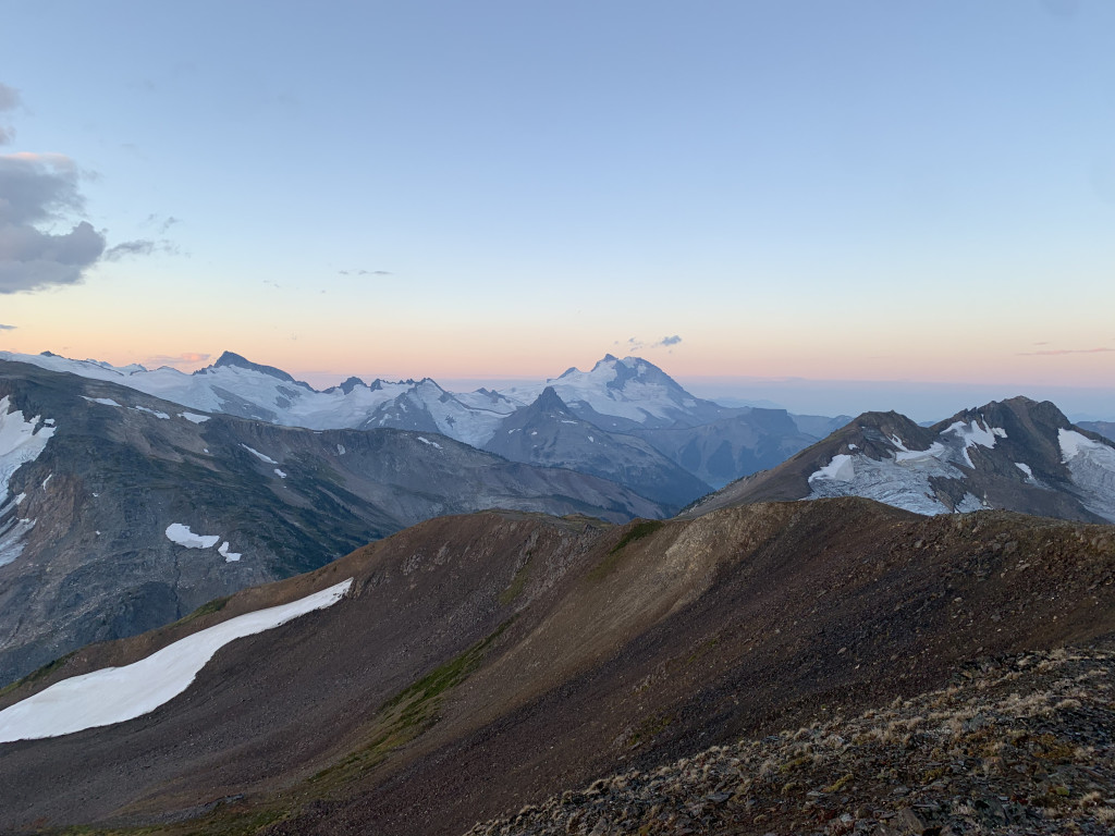 Looking to the mountains in the south, some of which are our objectives for the next few days. From right to left (somewhat): Gentian in the foreground, the Table blending into the background, Garibaldi and Atwell in the very back, Guard, Deception, and The Sphinx.  pc: Mona