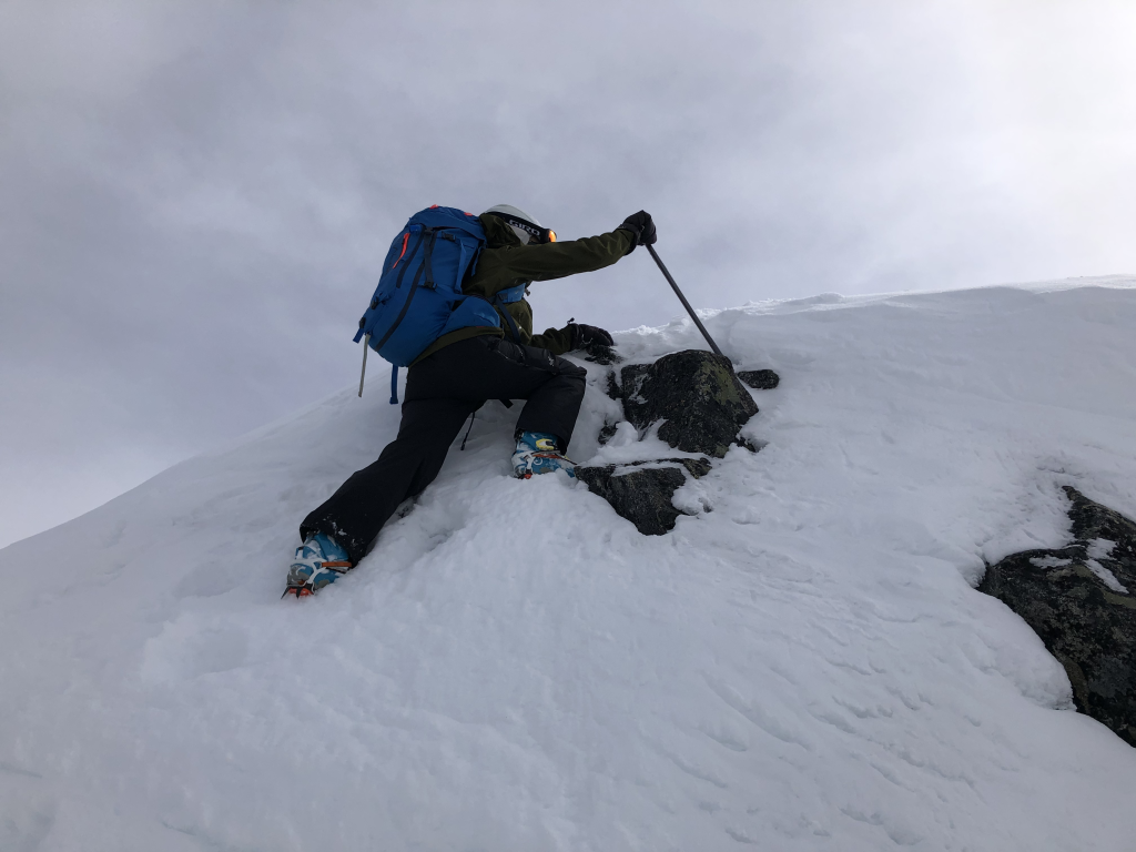 Flavia easily cruising up the final summit crux.