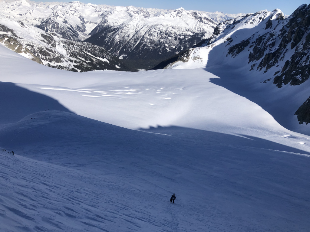 Alex starting up the long boot pack on the north face of Mt. Matier with the Matier Glacier spilling out below us.