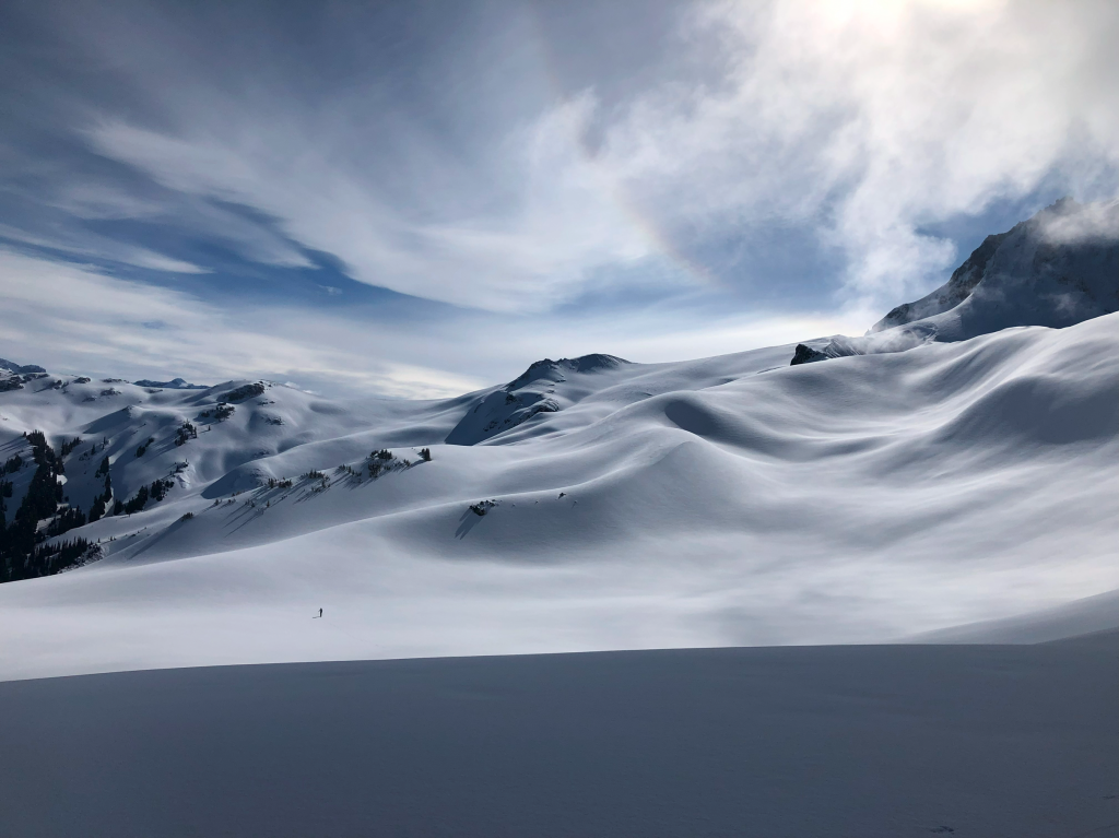 Travelling along Brohm Ridge towards Nch’kay with Alex way down below. For most of the year, this spot is full of motorised activities but on this day, we were the only people as far as the eye could see with no previous tracks anywhere in sight.