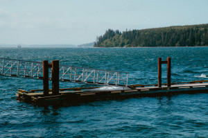 My boat thrashing around in the waves on the Alert Bay government dock.