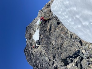 Isaac and Ray climbing down from the summit