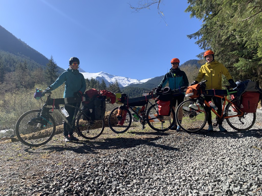 Three happy riders and the mountain they skied!