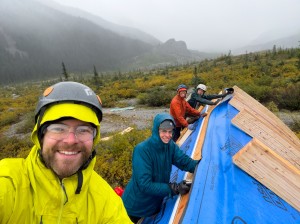 We're all so happy because the roof is sealed, because we're freezing and can't feel our fingers.