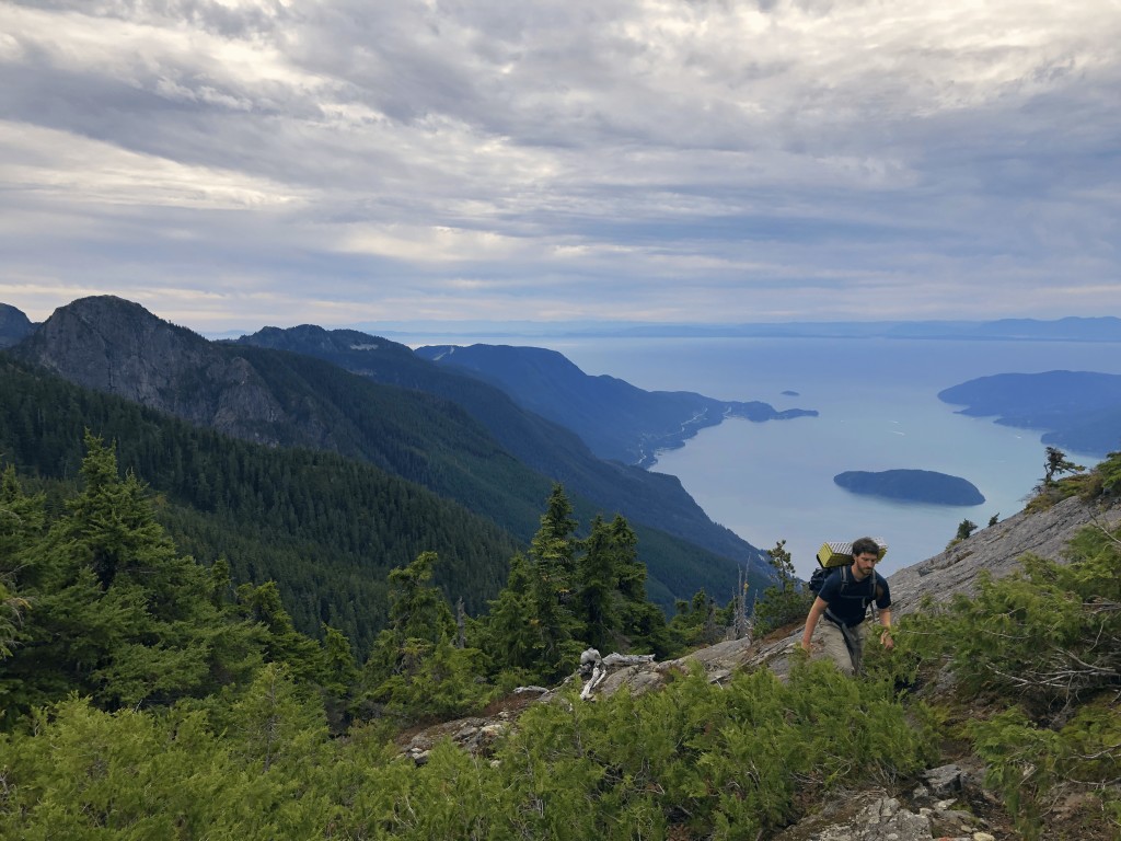 Looking to the south as we reach the summit of Hat Peak with Mount Harvey, and Howe Sound seen behind us.
