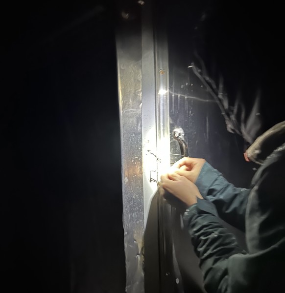 Inventing an outhouse latch. PC: Sophie Wigman