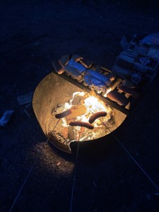 Sausages over the fire.
