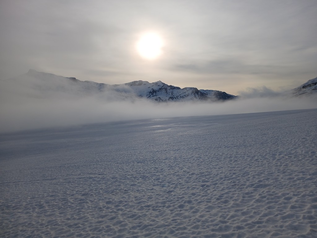Fog bank lifting off lower Lillooet Glacier