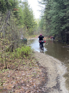 Alex cruising through an above average-sized puddle